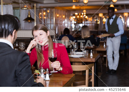 Woman with male colleague in restaurant Woman with male colleague in restaurant 45255646