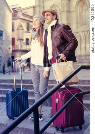 Man and woman with bags in autumn 45255899