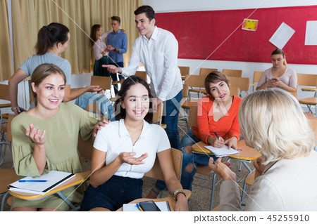 Students communicating during recess Students communicating during recess 45255910