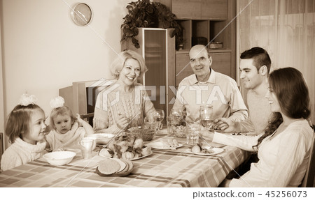 Family at the dining table 45256073