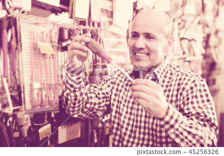 Ordinary senior man choosing tooking 45256326