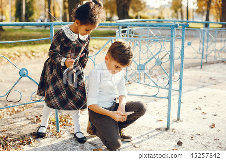 children in a park children in a park 45257842