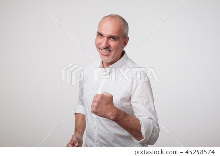 mature handsome business man with fist. mature handsome business man with fist. 45258574