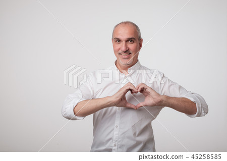 old european man making out of hands heart. old european man making out of hands heart. 45258585