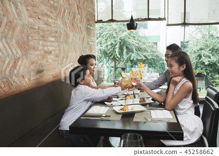 Family holiday at restaurant 45258662