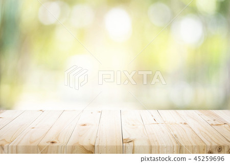 Empty table for present product with green bokeh. 45259696