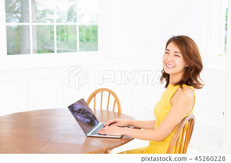 Woman looking at laptop computer 45260228