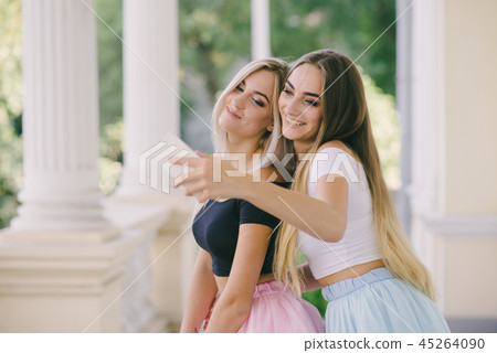 Girls with phone 45264090