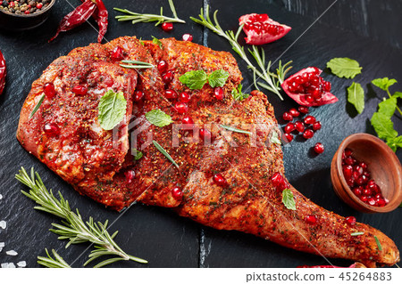 leg of a lamb marinated with spices 45264883