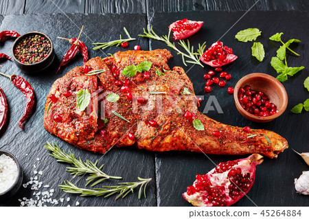 leg of a lamb marinated with spices 45264884