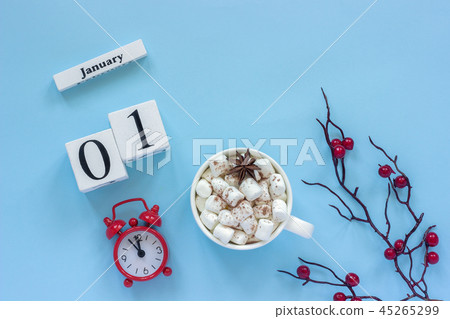 January 1st Cup of cocoa with marshmallows and alarm clock January 1st Cup of cocoa with marshmallows and alarm clock 45265299