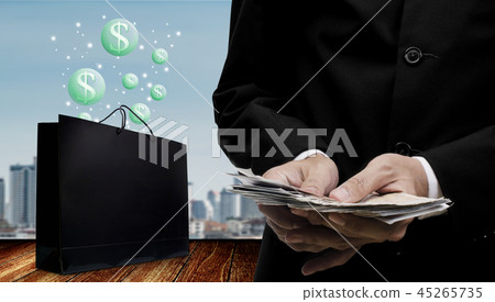 Businessman make profit from shopping mall Businessman make profit from shopping mall 45265735