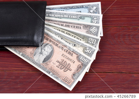 Old Cuban money in the black wallet Old Cuban money in the black wallet 45266789