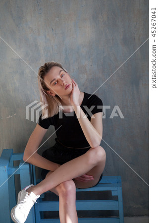 Portrait of fashionable women blondes on gray background 45267041