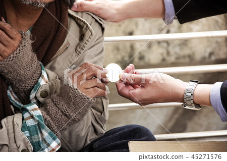 Business man money donation to homeless man Business man money donation to homeless man 45271576