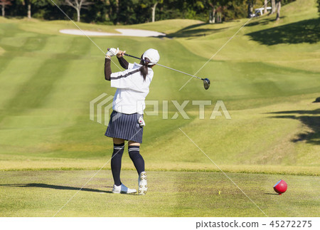 Female golfer tee shot play image image material 45272275