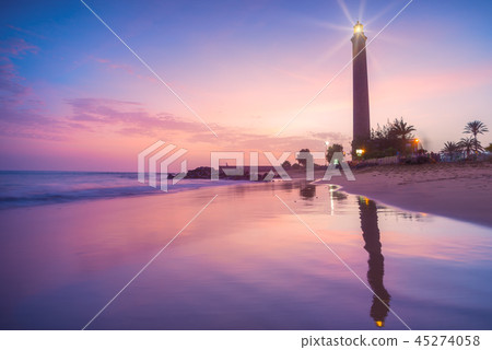 Lighthouse on the coast at sunset 45274058