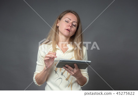 Portrait of european woman with tablet isolated on 45275622