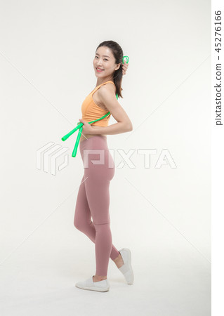 Korean woman exercising jump rope Korean woman exercising jump rope 45276166