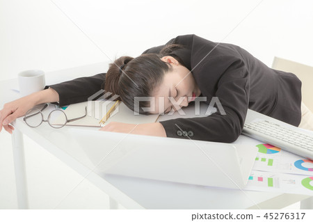 A tired Korean business woman A tired Korean business woman 45276317