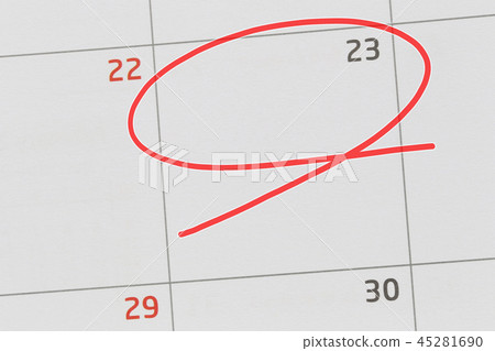 Focus on number 23 in calendar and empty red ellipse. 45281690