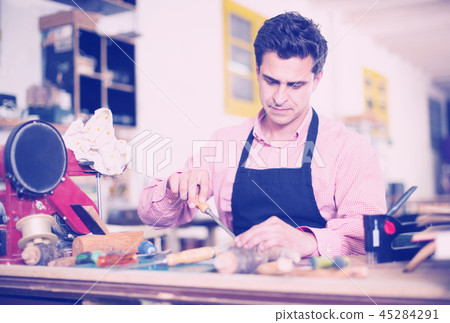 Carpenter working in studio 45284291