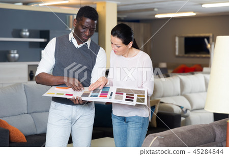 Happy couple is choosing colors for furniture 45284844