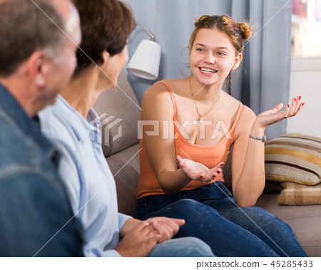 Happy family is talking about life on the sofa 45285433