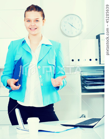 Woman is talking with partner before signing documents Woman is talking with partner before signing documents 45285639