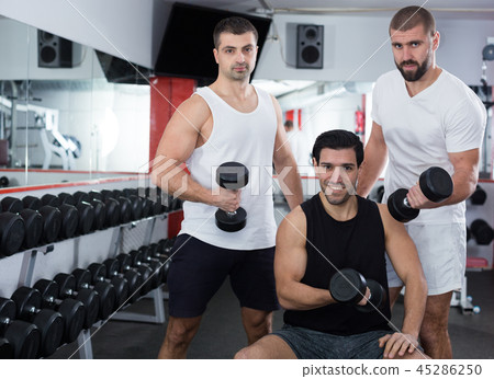 Three guys in training room Three guys in training room 45286250