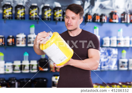 guy looking for necessary food supplements 45286332