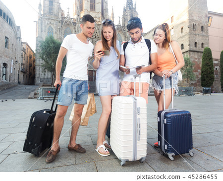 Travelers holding map and looking way Travelers holding map and looking way 45286455