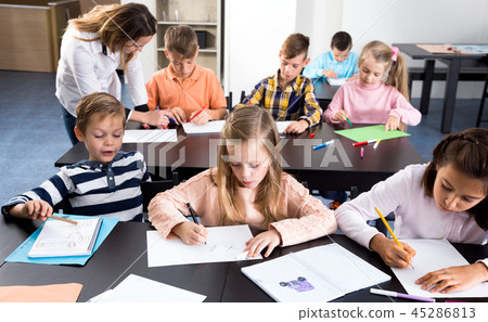 Professor and elementary age children 45286813