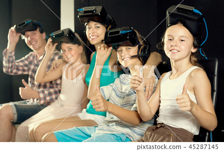 Family of five are turning thumbs up after watching movie 45287145