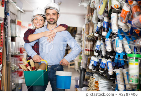 spouses in helmet with paint and instruments 45287406