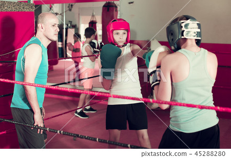 Boxer sparring on the ring 45288280