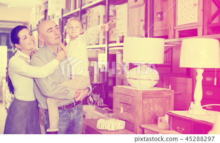 Family is choosing new furniture 45288297