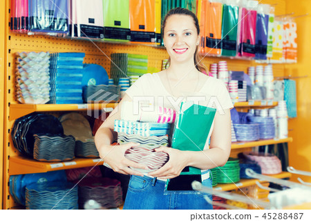 Female searching objects for kitchen at shop Female searching objects for kitchen at shop 45288487