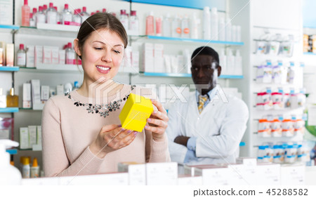 Female customer in pharmacy Female customer in pharmacy 45288582