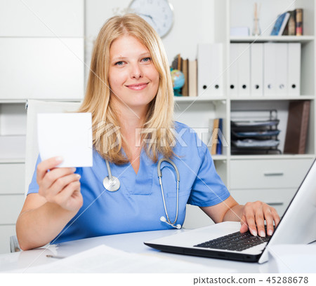 Doctor showing prescription with copyspace Doctor showing prescription with copyspace 45288678