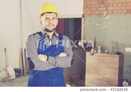 Portrait of workman which is doing repair 45288836