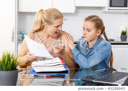 Mother dissatisfied with poor in studies of daughter Mother dissatisfied with poor in studies of daughter 45289043
