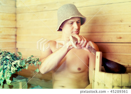 Man at sauna Man at sauna 45289361