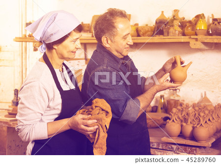 Elderly potters at ceramic workshop. Elderly potters at ceramic workshop. 45289760