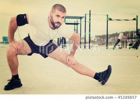 Warming up young man 45289857