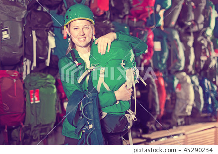 Ordinary girl chooses good backpack in store Ordinary girl chooses good backpack in store 45290234
