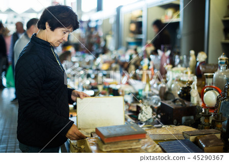 Adult woman is looking antiquariat Adult woman is looking antiquariat 45290367
