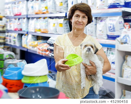Fine woman in search of dog bowl 45290458