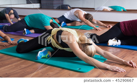 men and ladies learning yoga men and ladies learning yoga 45290667