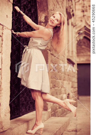 adult glad woman near the door 45290668